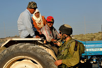 "Monitored" (2010):  Farmers from Jayyous returning to the village in the evening after a day's work