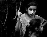 "All That Remains (2014): Young girls amid remains of their home in Gaza City destroyed in 2014.