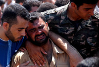 "Agony" (2006).  Father at funeral of his 10-year old son killed In Gaza City by Israeli missile.