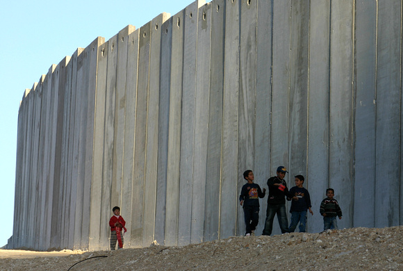 "In the Shadow of the Wall" (2003):  Young boys about to paint graffiti on the Wall, Al-ʿAyzariyyah