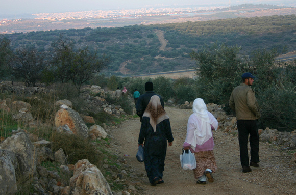 "Early Dawn" (2004):  Farmers from Jayyous in early morning going to their land.