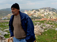 "Looming Large" (2012):  Izzat Q, farmer and teacher from Iraq Burin.
